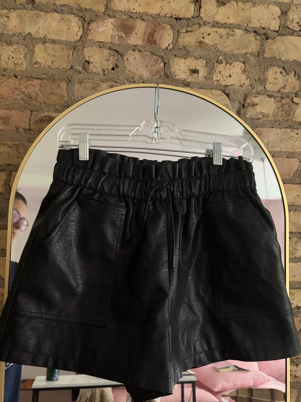 Black faux leather shorts
